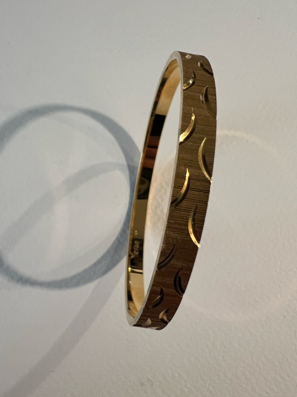 Trifari Gold-Tone Textured Crescent Bangle Bracelet - Picture 2 of 4